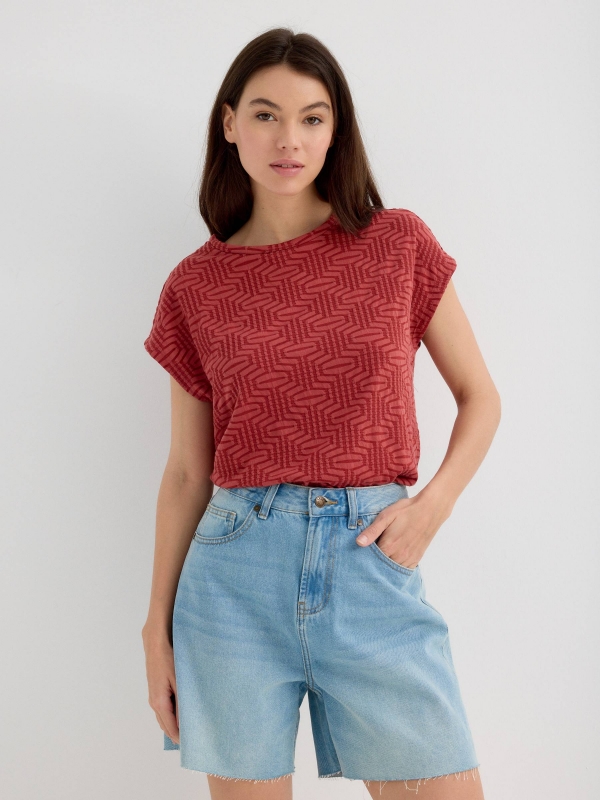 Sleeveless textured shirt brick red middle front view