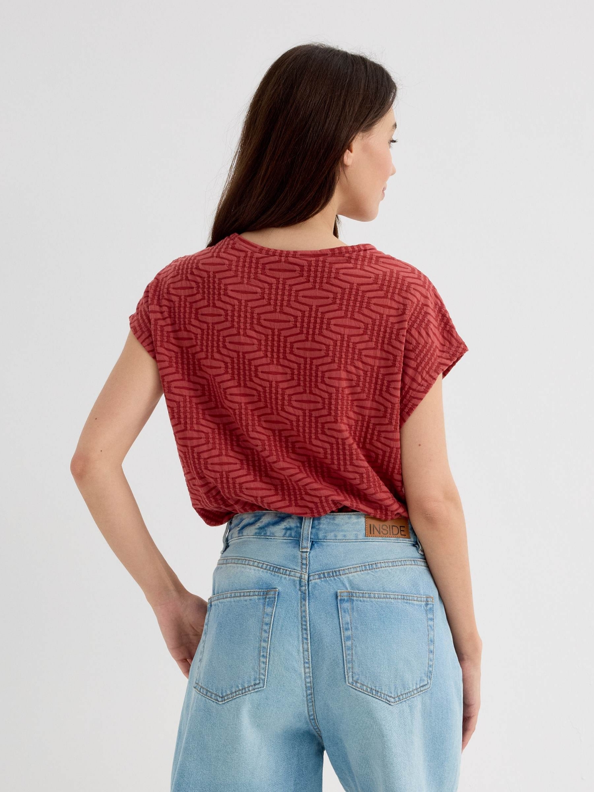 Sleeveless textured shirt brick red middle back view