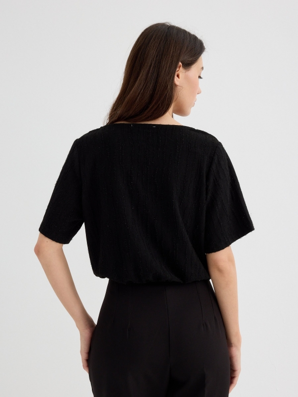 Short sleeve button shirt black middle back view