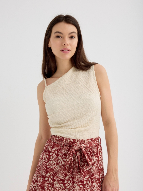 Asymmetric top with textured relief sand middle front view