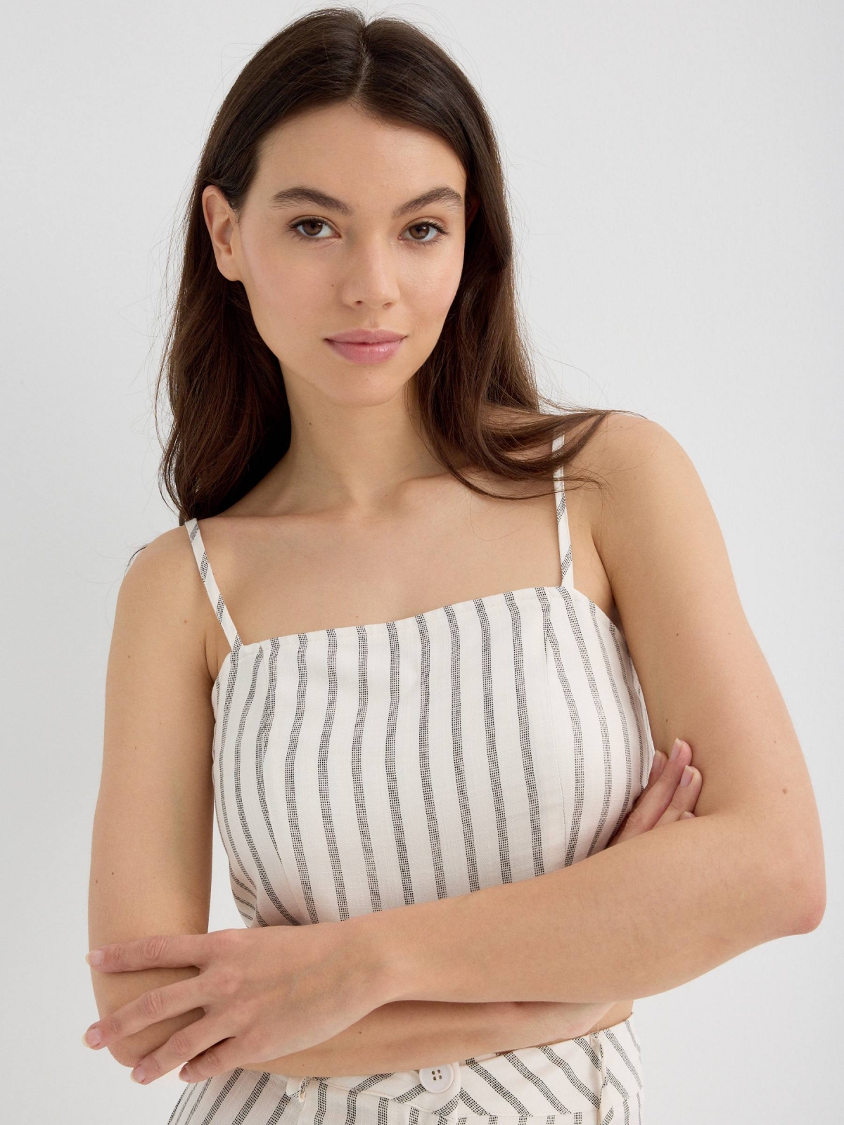 Rustic striped top off white detail view