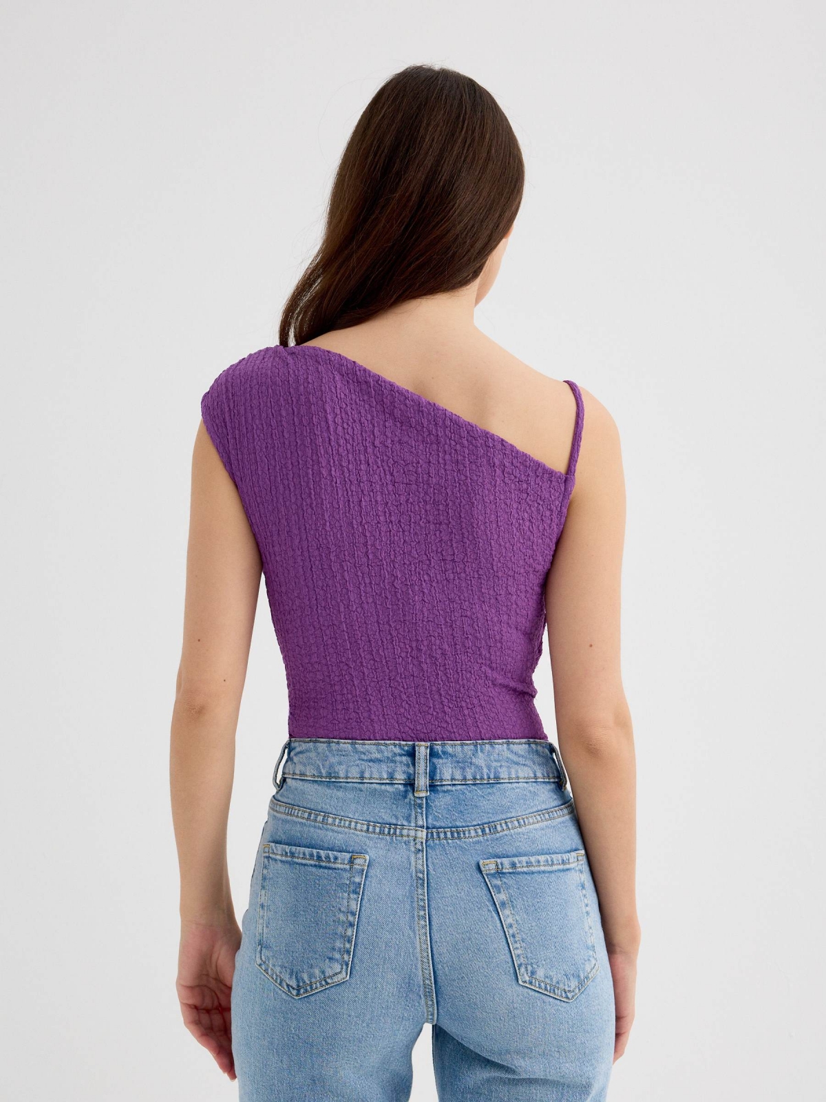 Asymmetric top with textured relief purple middle back view