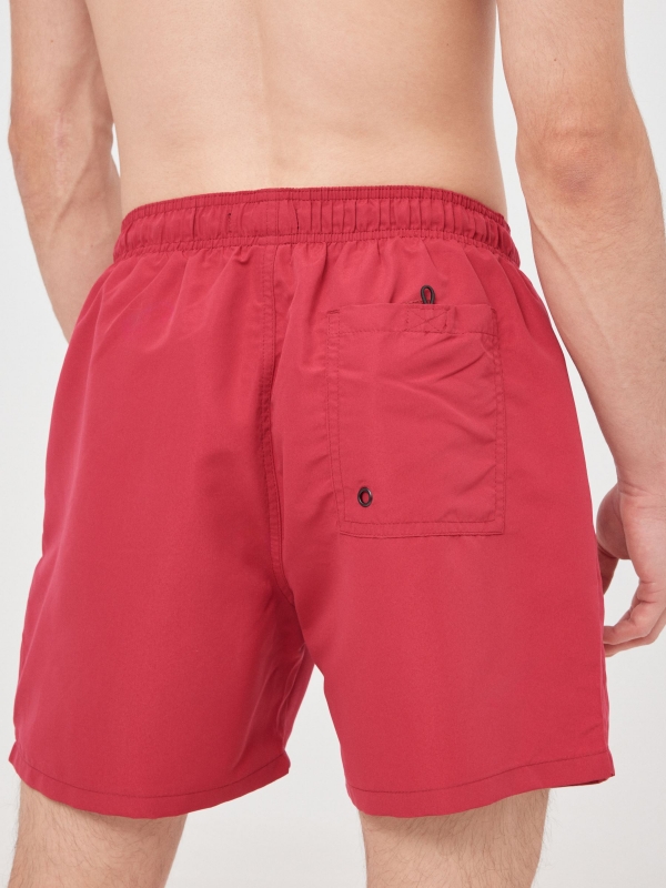 Basic swimsuit with pockets red back detail view