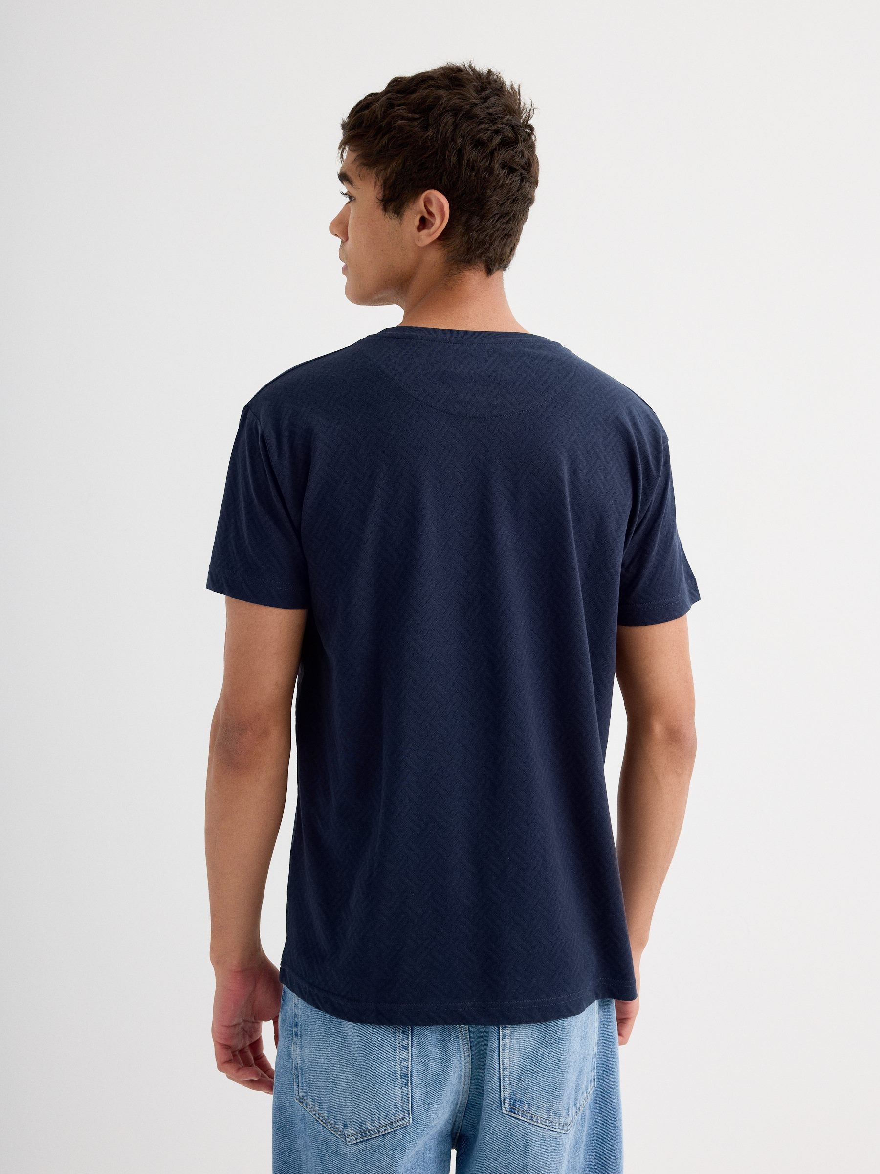Camiseta manga corta bolsillo jacquard azul marino vista media frontal