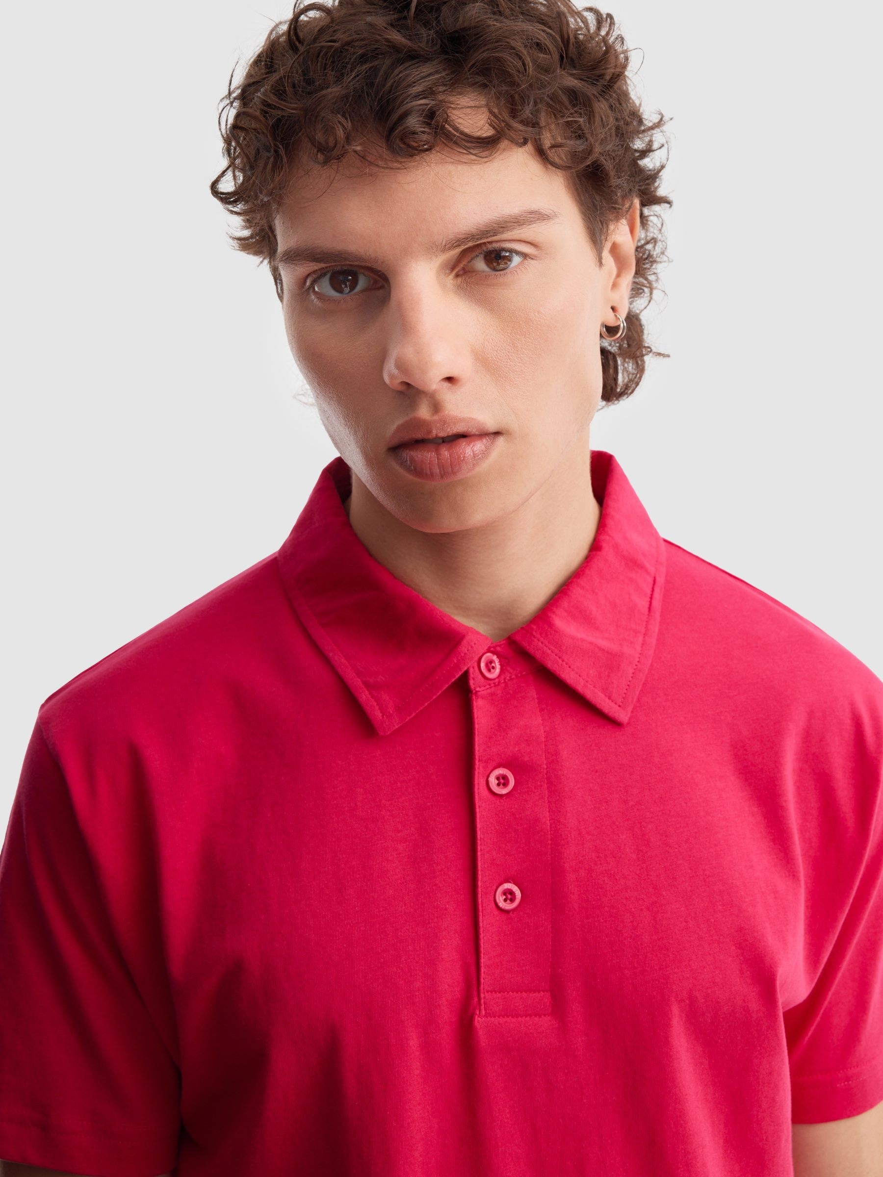 Polo básico manga curta fúcsia vista meia frontal