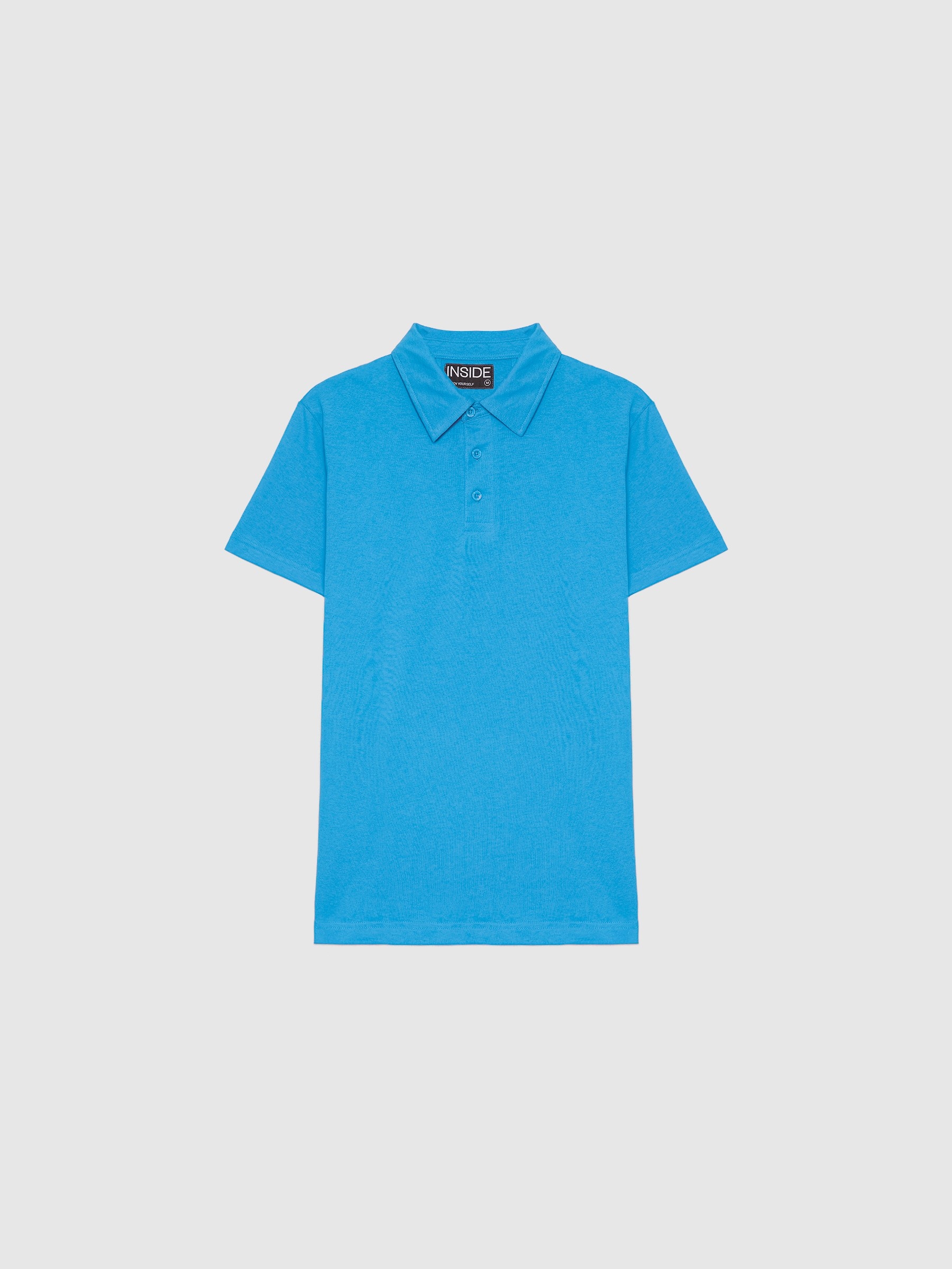 Polo básico manga corta azul vista media frontal