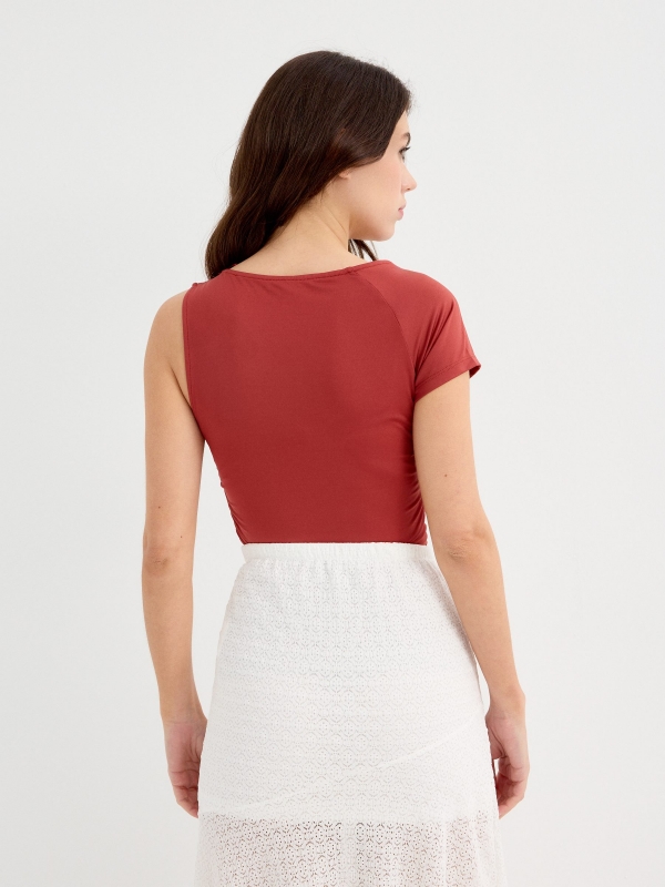 Ruched top with asymmetrical neckline brick red middle back view