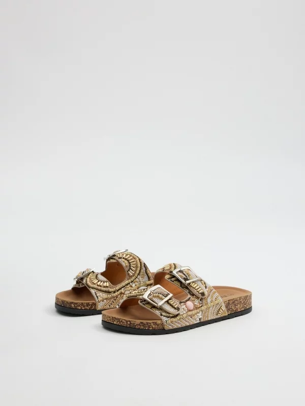 Double buckle sandal with rhinestones beige 45º front view