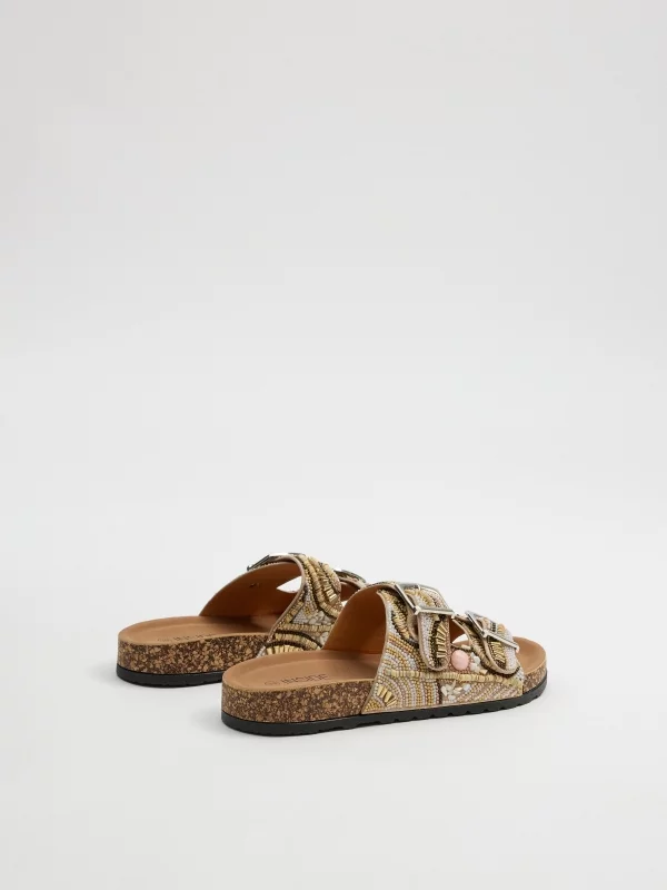 Double buckle sandal with rhinestones beige 45º back view