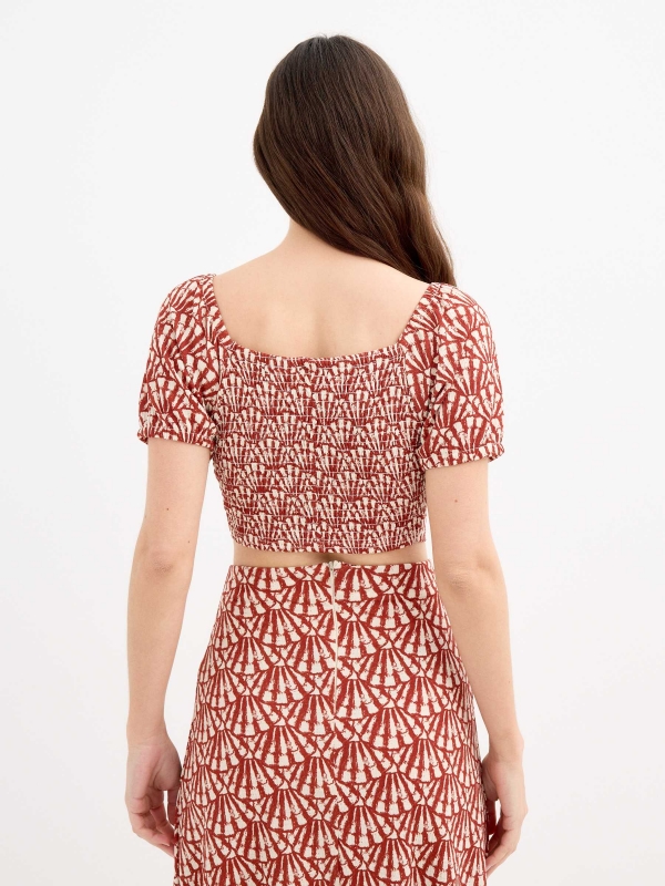 Printed tank top sand middle back view