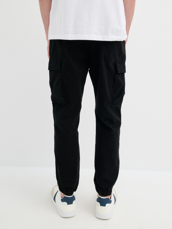 Cargo jogger pants black middle back view