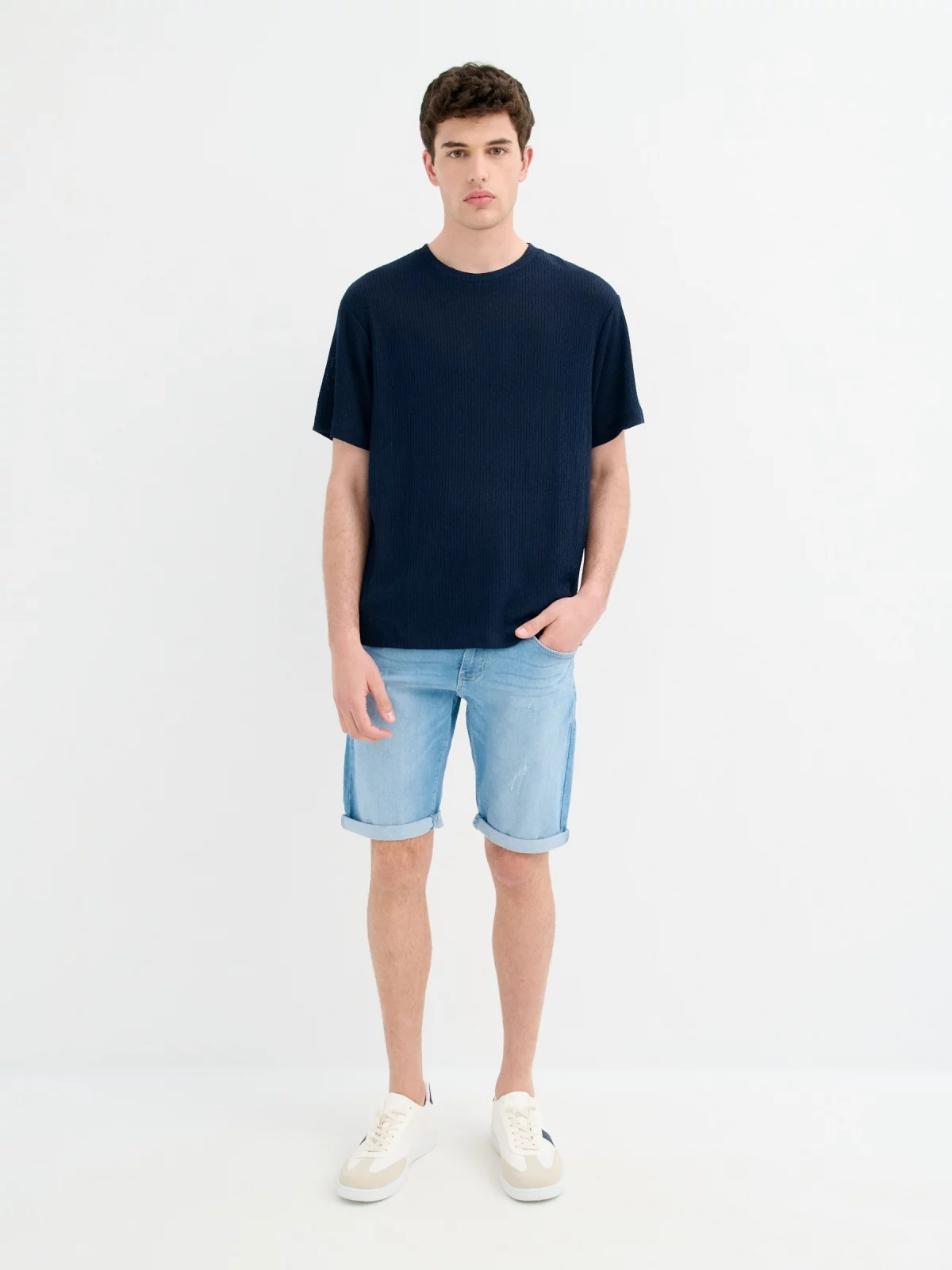 Ripped washed effect denim bermuda short blue general front view