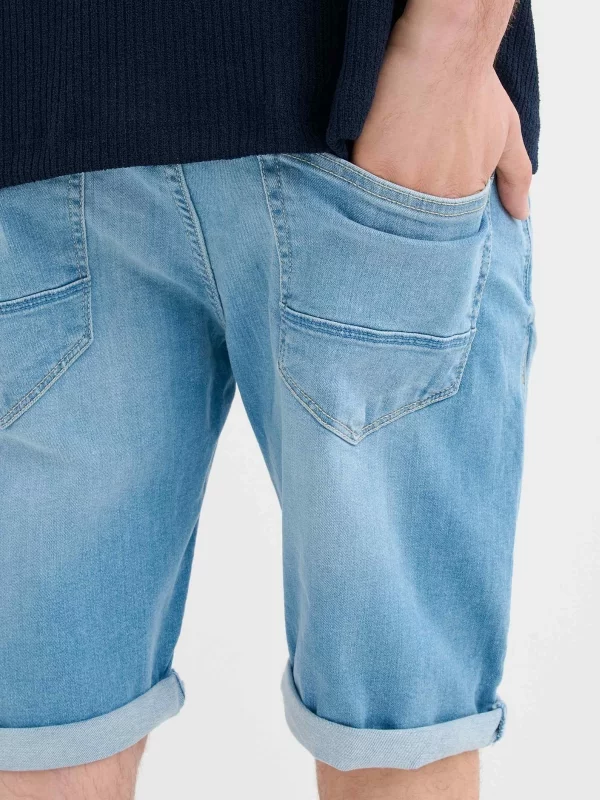 Ripped washed effect denim bermuda short blue detail view