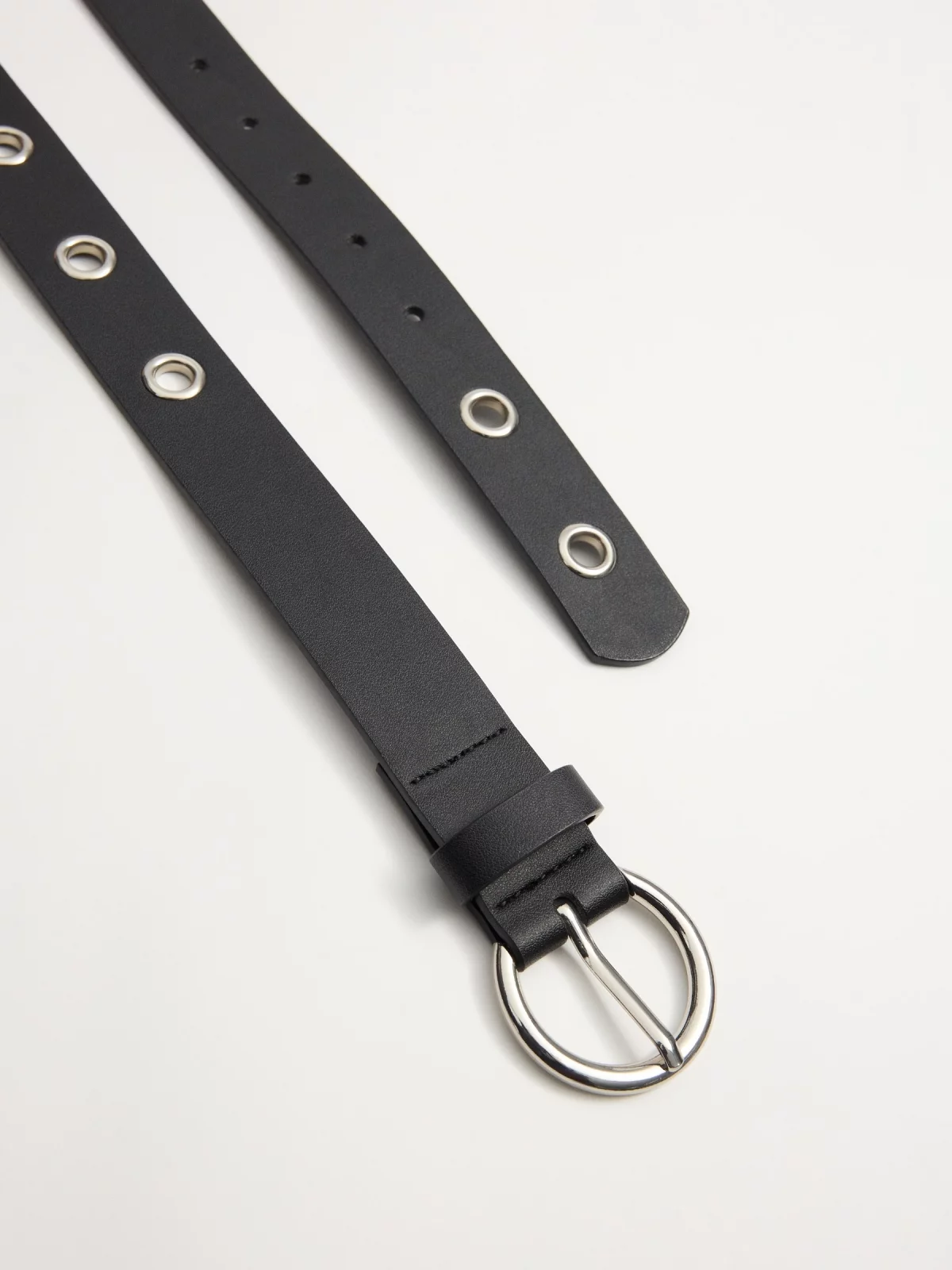 Black belt with metal eyelets black buckle