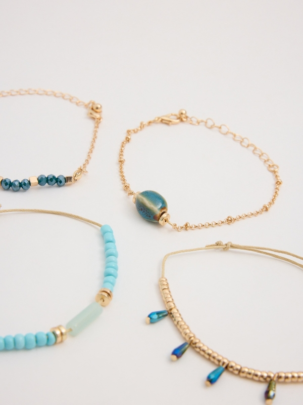 Set cuatro pulseras multicolor vista detalle