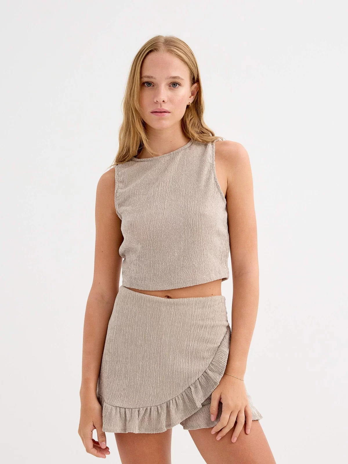 Sleeveless textured top taupe middle front view
