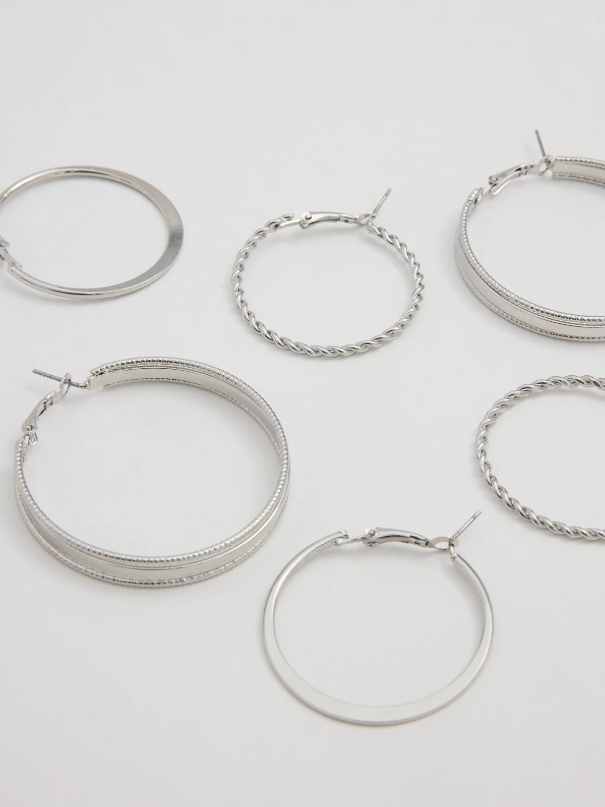 Set of 9 silver earrings multicolor detail view