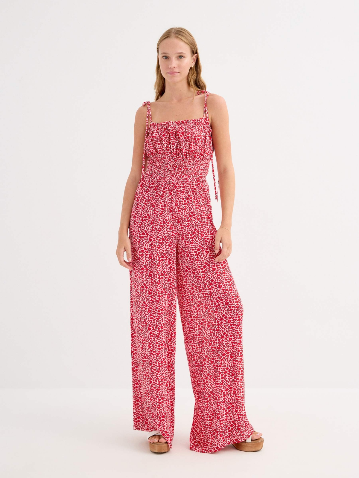 Long floral jumpsuit deep red front view