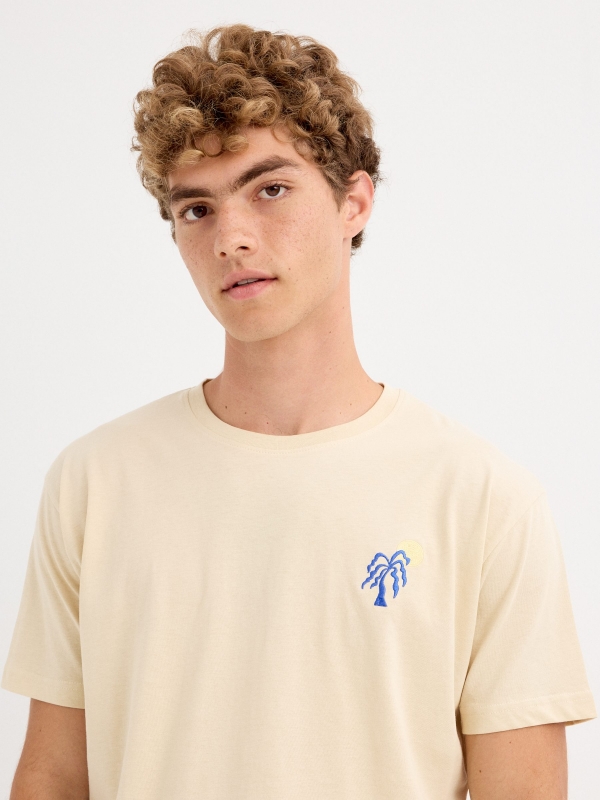 Palm tree t-shirt sand detail view