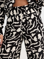 %Pto% Printed wide leg pants black
