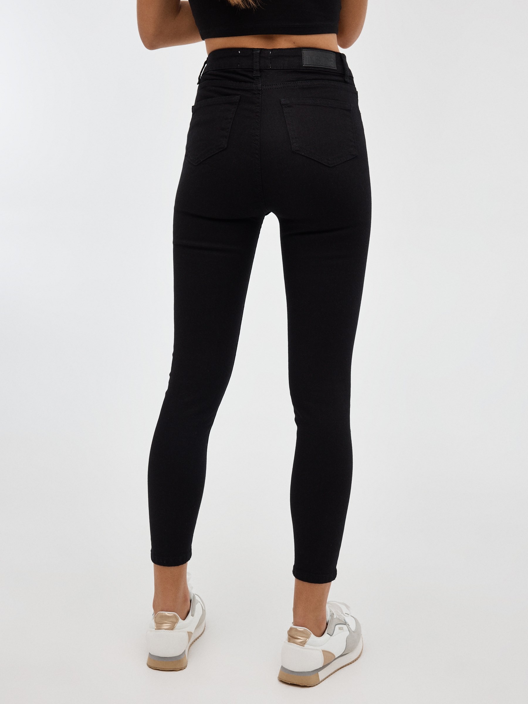 Calças skinny básicas preto vista geral frontal