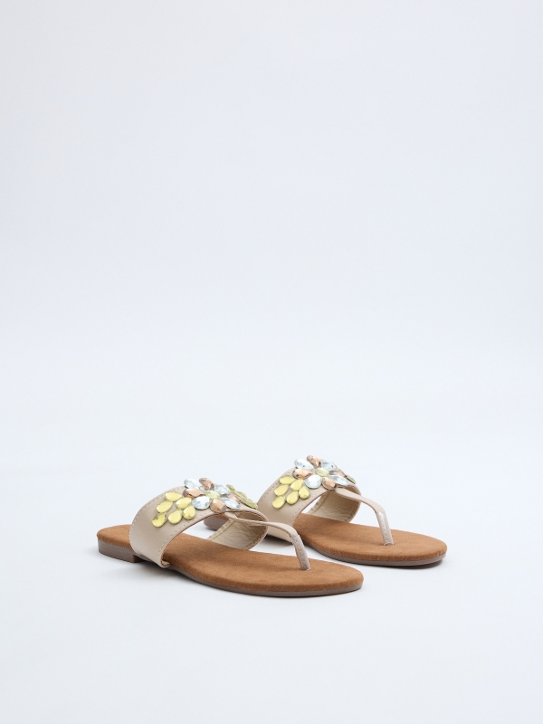 Sandalias brillos flor crudo vista frontal 45º