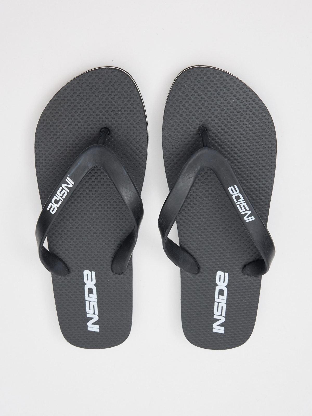 Black flip-flops black