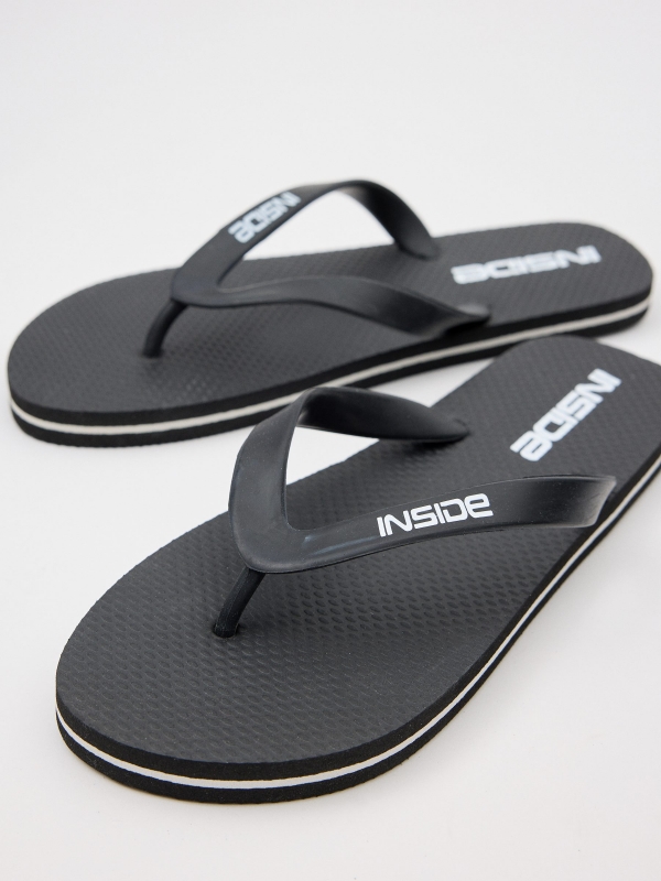Black flip-flops black detail view