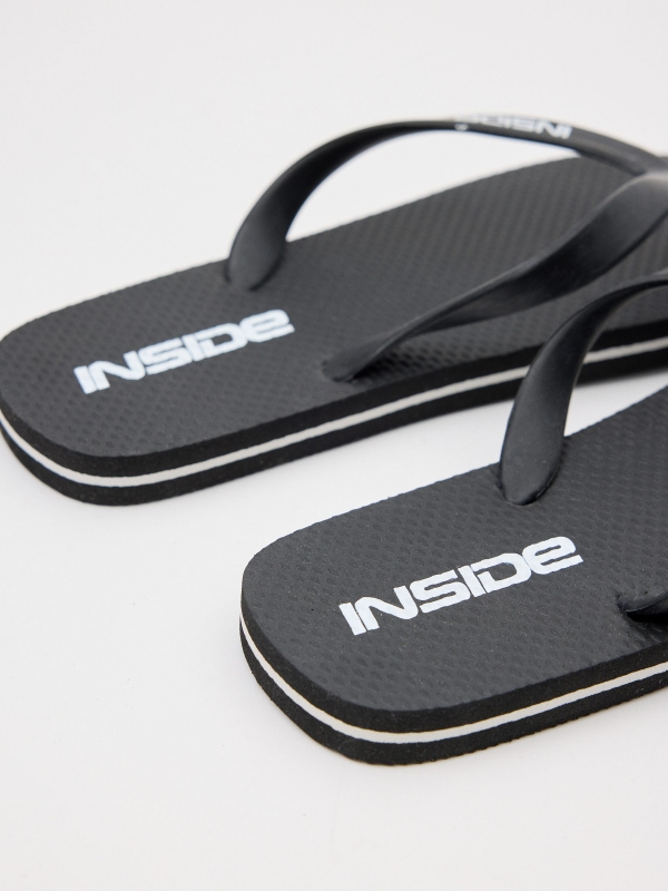 Black flip-flops black detail view