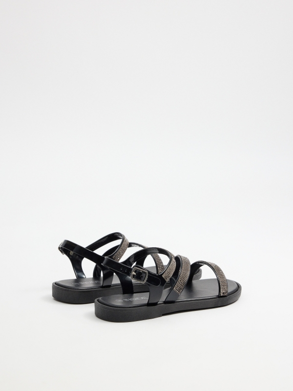 Black shiny strap sandal black 45º back view