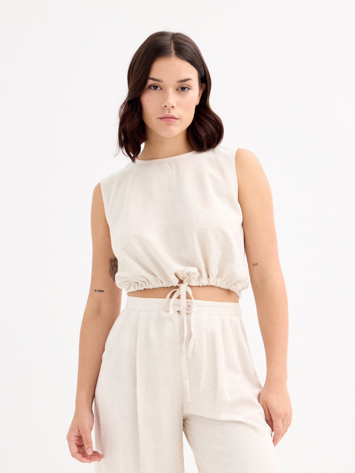 Sleeveless sand blouse beige middle front view
