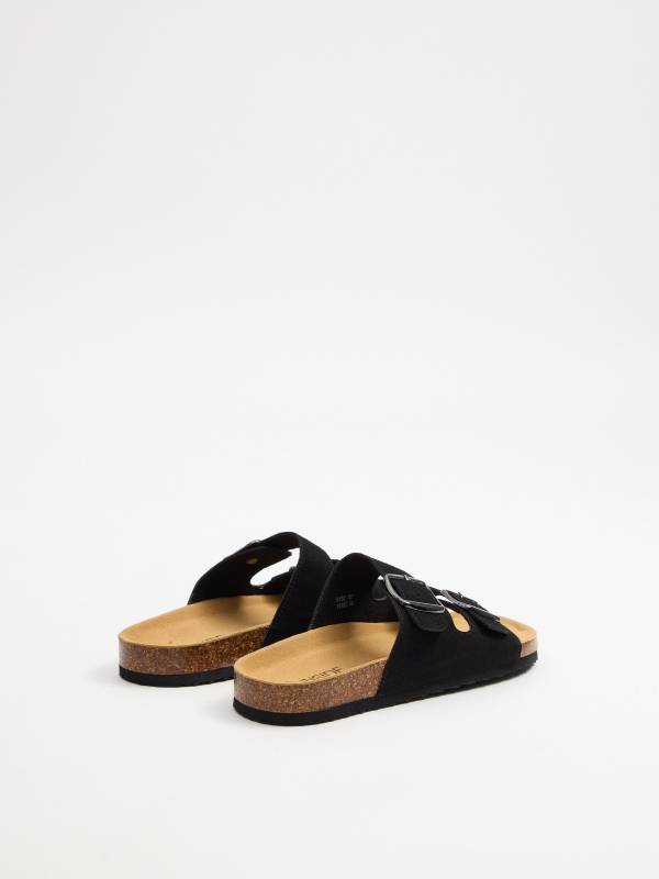 Black double strap flat sandal with buckle black 45º back view