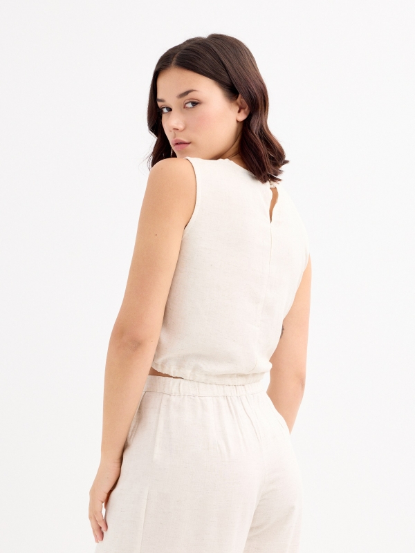 Sleeveless sand blouse beige middle back view
