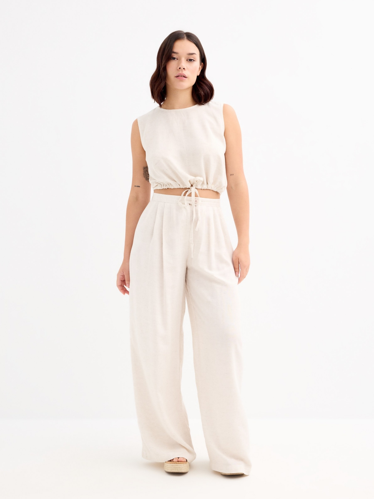Sleeveless sand blouse beige front view