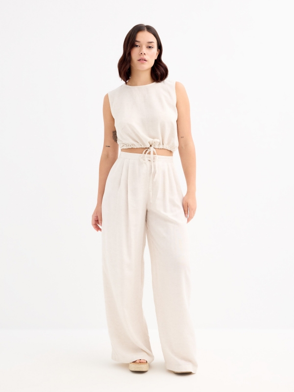 Sleeveless sand blouse beige front view