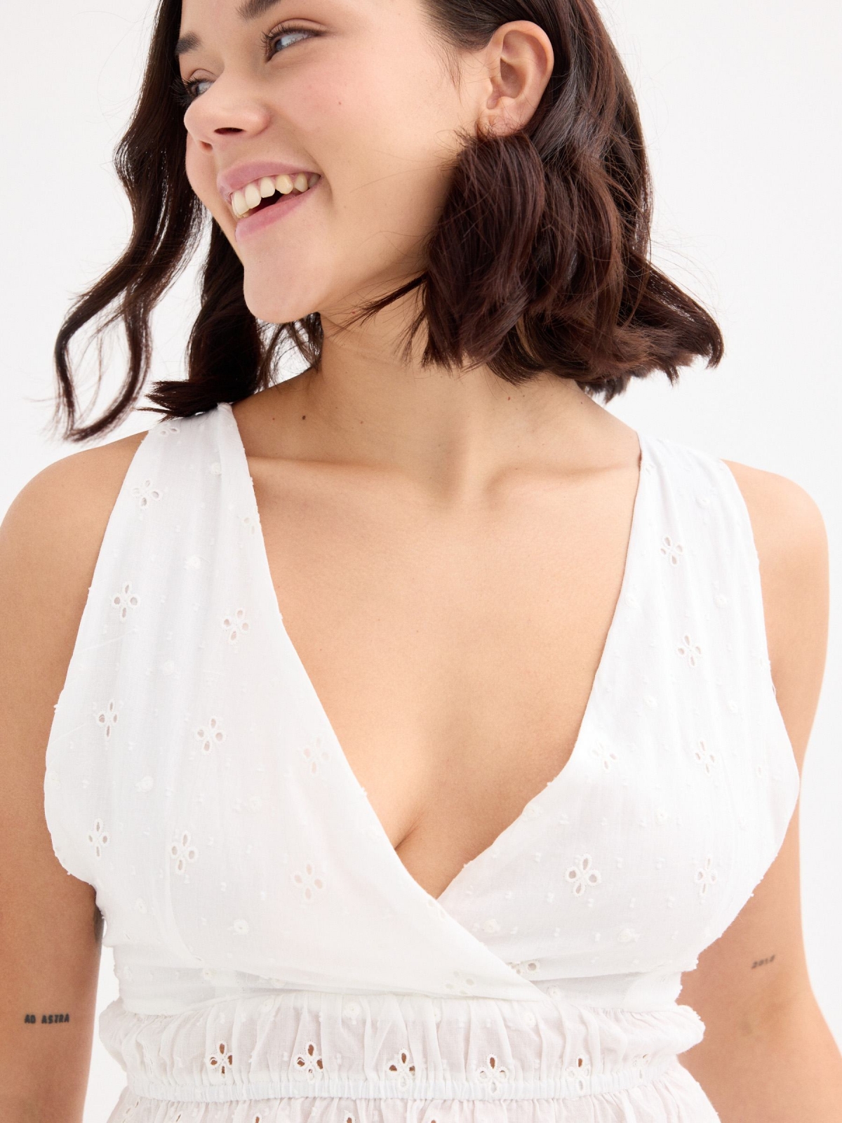 Embroidered backless top white front view