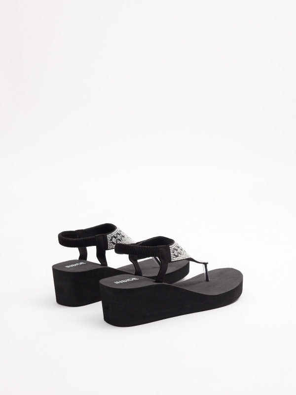 Wedge sandals with elastic closure black 45º back view