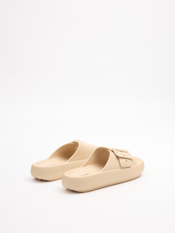 White platform sandal buckle sand 45º back view