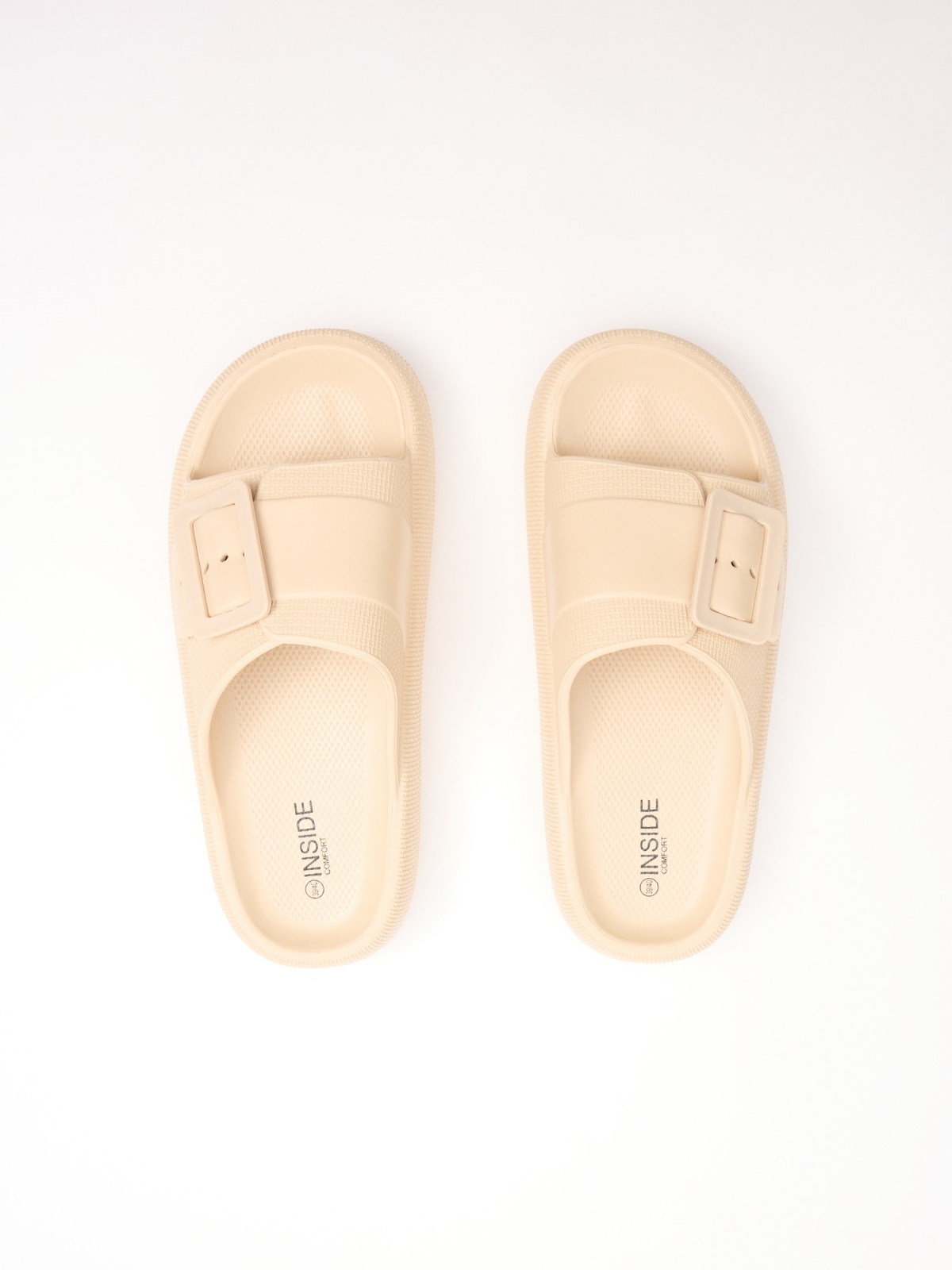 White platform sandal buckle sand 45º back view