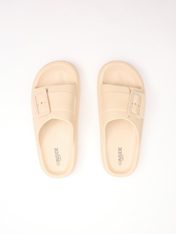 White platform sandal buckle sand 45º back view