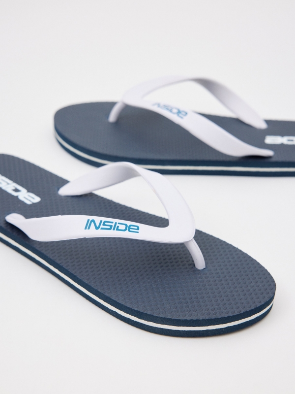 Navy blue flip-flops navy detail view