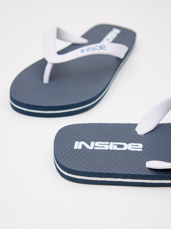Navy blue flip-flops navy detail view