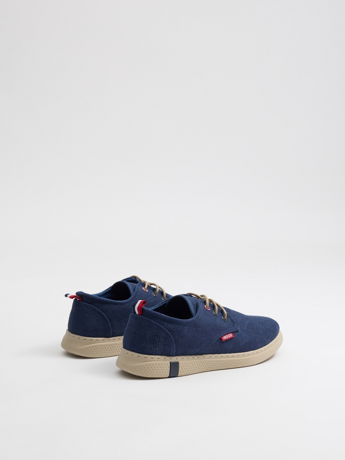 Blue canvas shoes dark blue