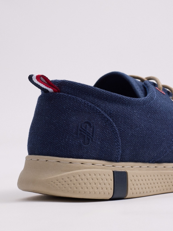 Blue canvas shoes dark blue