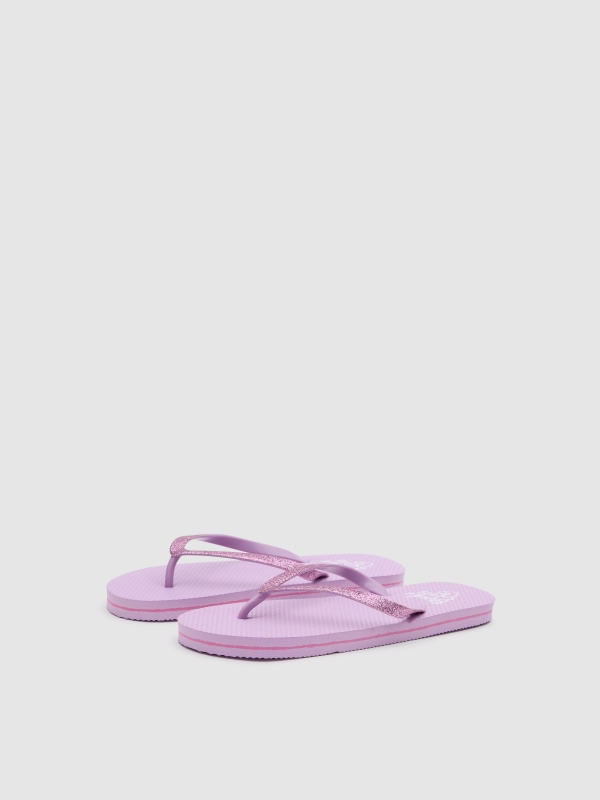 Sparkly flip-flops pink 45º front view
