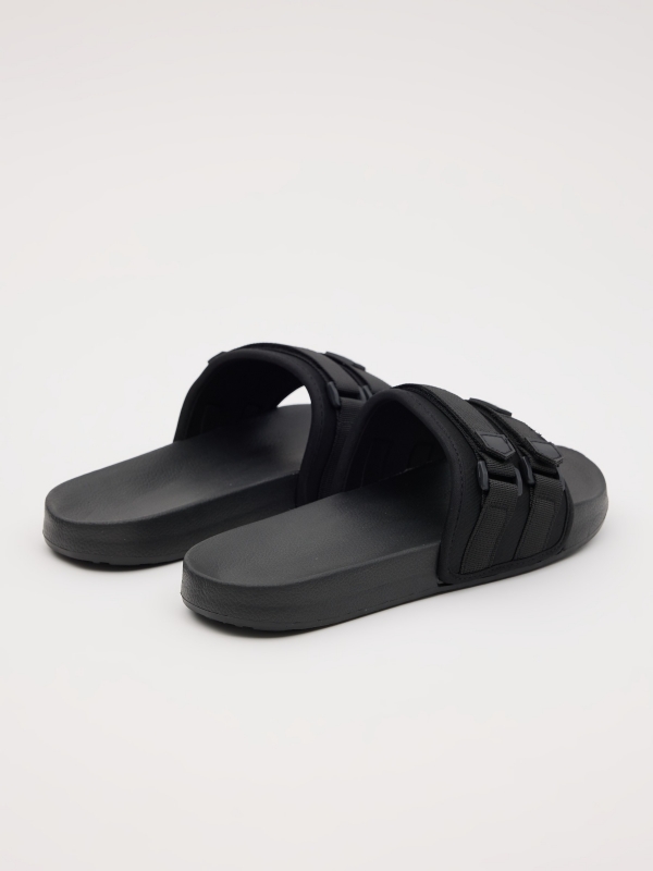 Chanclas pala hebilla negro vista trasera 45º