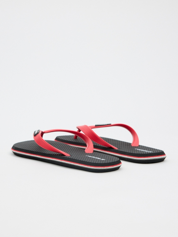 Black flip-flops black 45º back view