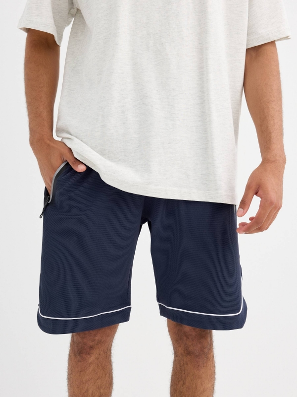 Bermuda navy blue sports shorts navy middle back view