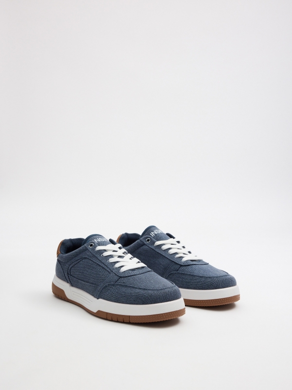 Zapatilla skater combinada vaquera azul acero vista frontal 45º