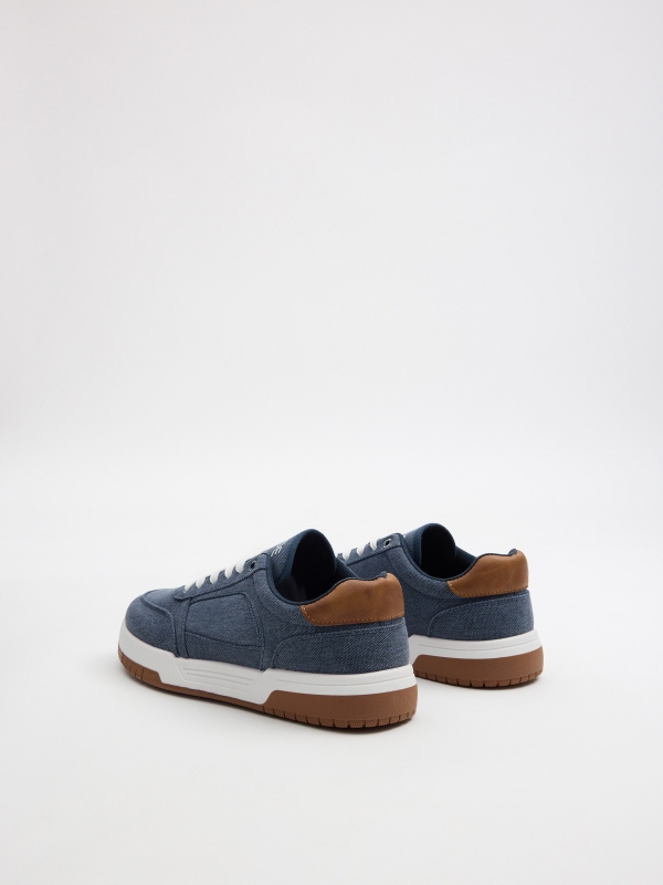 Zapatilla skater combinada vaquera azul acero vista trasera 45º